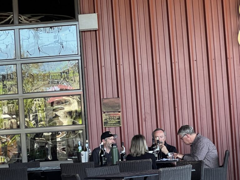 2 owners to the right having lunch